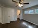 Bedroom with tile flooring, double door closet and en-suite bathroom at 9041 J M Keynes Dr # 10, Charlotte, NC 28262