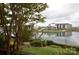 Luxury apartments overlook a peaceful lake, offering scenic waterfront views at 9041 J M Keynes Dr # 10, Charlotte, NC 28262