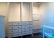 Organized closet with custom shelving and drawers, providing ample storage space at 9489 Westridge Dr, Hickory, NC 28601