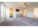 Spacious main bedroom with ample closet space, ceiling fan, and large windows for natural light at 9489 Westridge Dr, Hickory, NC 28601