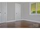 Bright bedroom featuring hardwood floors and multiple windows at 1007 W Horah St, Salisbury, NC 28144