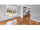 Dining area with hardwood floors and natural light is adjacent to the kitchen at 1116 Circlewood Dr, Charlotte, NC 28211