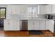 Modern kitchen with white cabinets, subway tile backsplash, and stainless steel appliances at 1116 Circlewood Dr, Charlotte, NC 28211