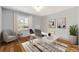 Bright office space with hardwood floors, neutral walls, and a large window at 1116 Circlewood Dr, Charlotte, NC 28211