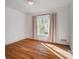 Sunny bedroom with hardwood floors and a window with natural light at 1139 Shady Bluff Dr, Charlotte, NC 28211