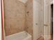 Tiled bathroom with shower/tub and linen closet at 11756 Easthampton Cir, Charlotte, NC 28277