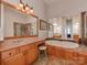 Bathroom boasts a luxurious soaking tub, double vanity, and a walk-in shower at 11756 Easthampton Cir, Charlotte, NC 28277