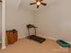 Private exercise room with treadmill and other fitness equipment at 11756 Easthampton Cir, Charlotte, NC 28277