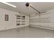 Clean and spacious garage with epoxy flooring and storage shelving at 11756 Easthampton Cir, Charlotte, NC 28277