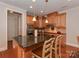 Spacious kitchen with large island, granite countertops, and stainless steel appliances at 11756 Easthampton Cir, Charlotte, NC 28277