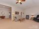 Sitting area with couch, chairs, and a coffee table at 11756 Easthampton Cir, Charlotte, NC 28277