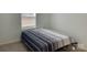 Simple bedroom with window and striped bedding at 1194 Great Falls Hwy, Chester, SC 29706
