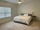 Large bedroom with a king-size bed and large window at 1194 Great Falls Hwy, Chester, SC 29706