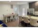 Bright dining area with farmhouse table and access to backyard at 1194 Great Falls Hwy, Chester, SC 29706