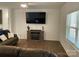 Spacious living room with hardwood floors and a fireplace at 1194 Great Falls Hwy, Chester, SC 29706