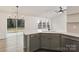 Modern kitchen with stainless steel appliances and island at 13311 Arbor Meadows Ct, Charlotte, NC 28269