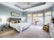 Main bedroom with bay windows and tray ceiling at 134 Mills Ln, Fort Mill, SC 29708