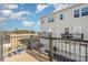 Backyard view from the deck showcasing the outdoor space and garages at 1419 Newell Towns Ln, Charlotte, NC 28262