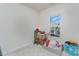 Spare bedroom with a window showing neighborhood at 1419 Newell Towns Ln, Charlotte, NC 28262