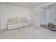 Spacious living room with neutral walls, plush carpeting, and a comfortable, light colored sofa at 1419 Newell Towns Ln, Charlotte, NC 28262