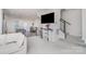 Open living room with a view of the modern kitchen and dining area, creating a seamless flow at 1419 Newell Towns Ln, Charlotte, NC 28262