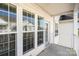 Balcony with multiple windows overlooking adjacent apartments and complex at 14967 Santa Lucia Dr, Charlotte, NC 28277