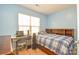 Bedroom with a double bed, built-in shelves, and workspace at 151 High Bluff Cir, Mooresville, NC 28115