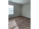Well-lit bedroom with carpet and large window at 155 Trail Wood Ct, Salisbury, NC 28146