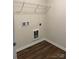 Laundry room with vinyl flooring and shelving at 155 Trail Wood Ct, Salisbury, NC 28146