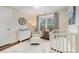 This charming Bedroom features a neutral palette, comfortable seating, and a lovely natural light at 166 S Smallwood Pl, Charlotte, NC 28208