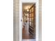 Elegant entry with a glass-paned door and hardwood floors at 176 Broadleaf Dr, Denver, NC 28037