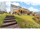 Elevated deck with stairs, offering lake views and ample outdoor space at 17909 Wilbanks Dr, Charlotte, NC 28278