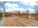 Enjoy tranquil lake views from this expansive wooden deck at 17909 Wilbanks Dr, Charlotte, NC 28278