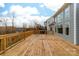 Large deck with lake views and wooded backdrop, great for entertaining at 17909 Wilbanks Dr, Charlotte, NC 28278