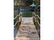Wooden dock with rope railings over the lake at 17909 Wilbanks Dr, Charlotte, NC 28278