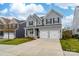 Two story home with gray siding and two car garage at 17909 Wilbanks Dr, Charlotte, NC 28278