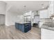 Spacious kitchen with island, stainless steel appliances, and light hardwood floors at 17909 Wilbanks Dr, Charlotte, NC 28278