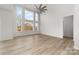 Bright living room with vaulted ceiling, hardwood floors, and deck access at 17909 Wilbanks Dr, Charlotte, NC 28278