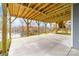Lakefront patio with wooden stairs and view of the lake at 17909 Wilbanks Dr, Charlotte, NC 28278