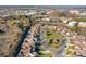 Aerial view showcasing the home and its proximity to local shops and dining at 19411 Greentree Way, Cornelius, NC 28031