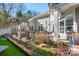 Outdoor patio with seating area, grill, and artificial turf at 19411 Greentree Way, Cornelius, NC 28031