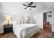 Bedroom with a queen bed and ensuite bathroom access at 19411 Greentree Way, Cornelius, NC 28031