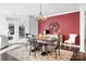 Formal dining room with a statement wall and chandelier at 19411 Greentree Way, Cornelius, NC 28031