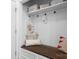 Mudroom with bench, cubbies, and hooks for storage at 19411 Greentree Way, Cornelius, NC 28031