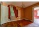 Bedroom with wood floors and walls and ceiling in need of repair at 2021 Willis Dr, Shelby, NC 28152