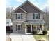 Two-story house with gray siding and a welcoming front porch at 212 Old Centergrove Rd # 111, Kannapolis, NC 28083