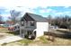 Two-story house with gray siding, a covered porch, and a landscaped yard at 212 Old Centergrove Rd # 111, Kannapolis, NC 28083