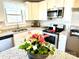 Modern kitchen with white cabinets, granite countertops, and stainless steel appliances at 212 Old Centergrove Rd # 111, Kannapolis, NC 28083
