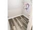 Laundry room with vinyl flooring and overhead shelving at 212 Old Centergrove Rd # 111, Kannapolis, NC 28083