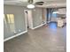 Spacious living room with gray walls and wood-look flooring at 212 Old Centergrove Rd # 111, Kannapolis, NC 28083